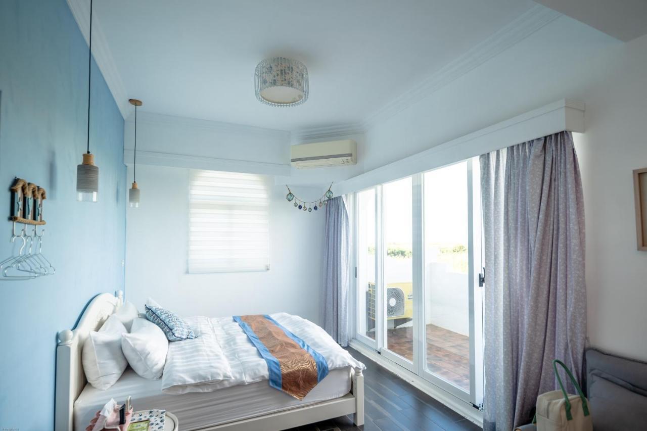 夏日澄藍the Charming Land Apartment Baisha Exterior foto